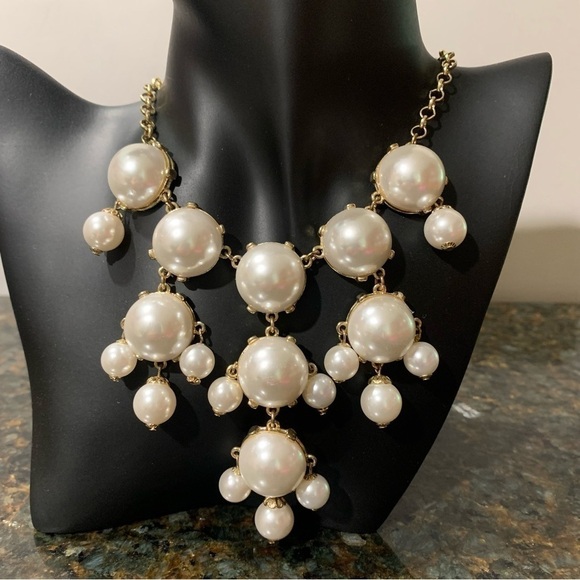 Jewelry - Oversized faux pearl and gold toned necklace.
